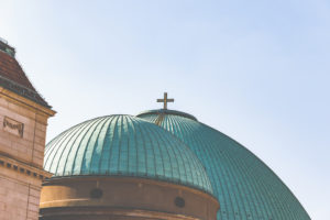 The St. Hedwig's Cathedral in Berlin, dome and cross. The St. Hedwig's Cathedral in Berlin, dome and cross.